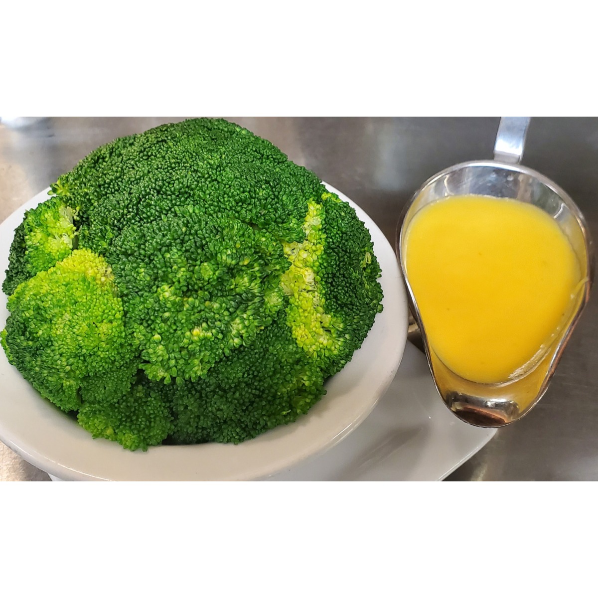 Order Steamed Broccoli food online from LG's Prime Steakhouse store, La Quinta on bringmethat.com