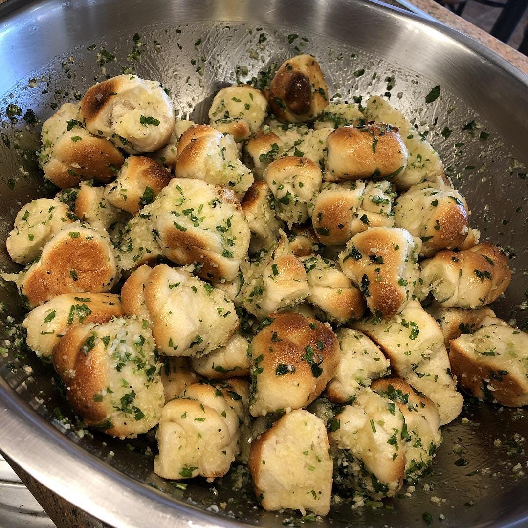 Order Garlic Knots - 6 Pieces food online from Taste of Italy store, Avenel on bringmethat.com