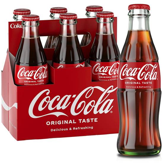 Order Coca Cola Soda Soft Drink Pack Of 6 food online from Deerings Market store, Traverse City on bringmethat.com
