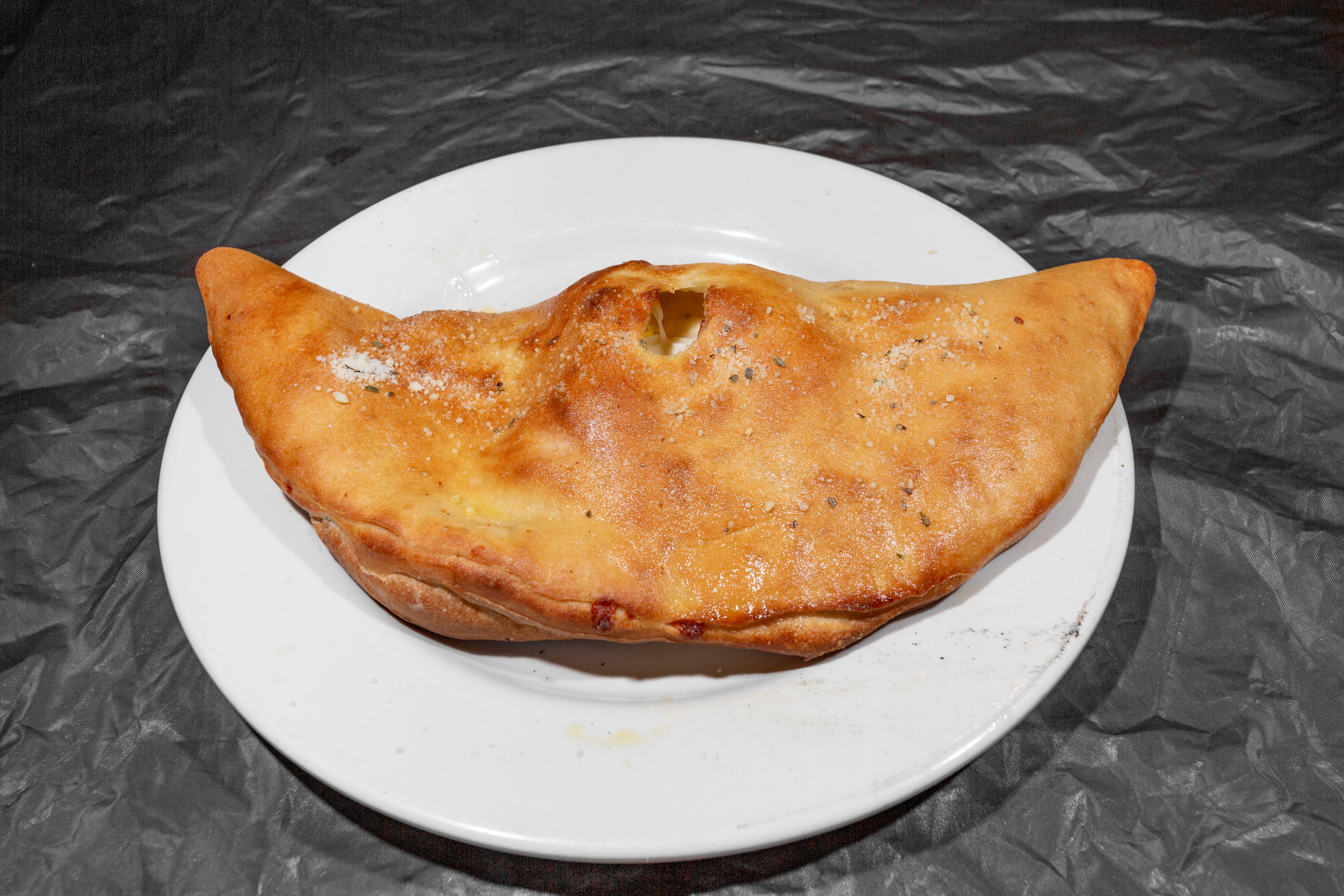 Order Plain Calzone - Personal food online from Alcamo Italian Restaurant & Brick Oven Pizza store, Richlandtown on bringmethat.com