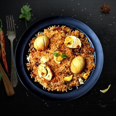 Order Egg Masala Pulav food online from Peacock Indian Cuisine store, Plano on bringmethat.com