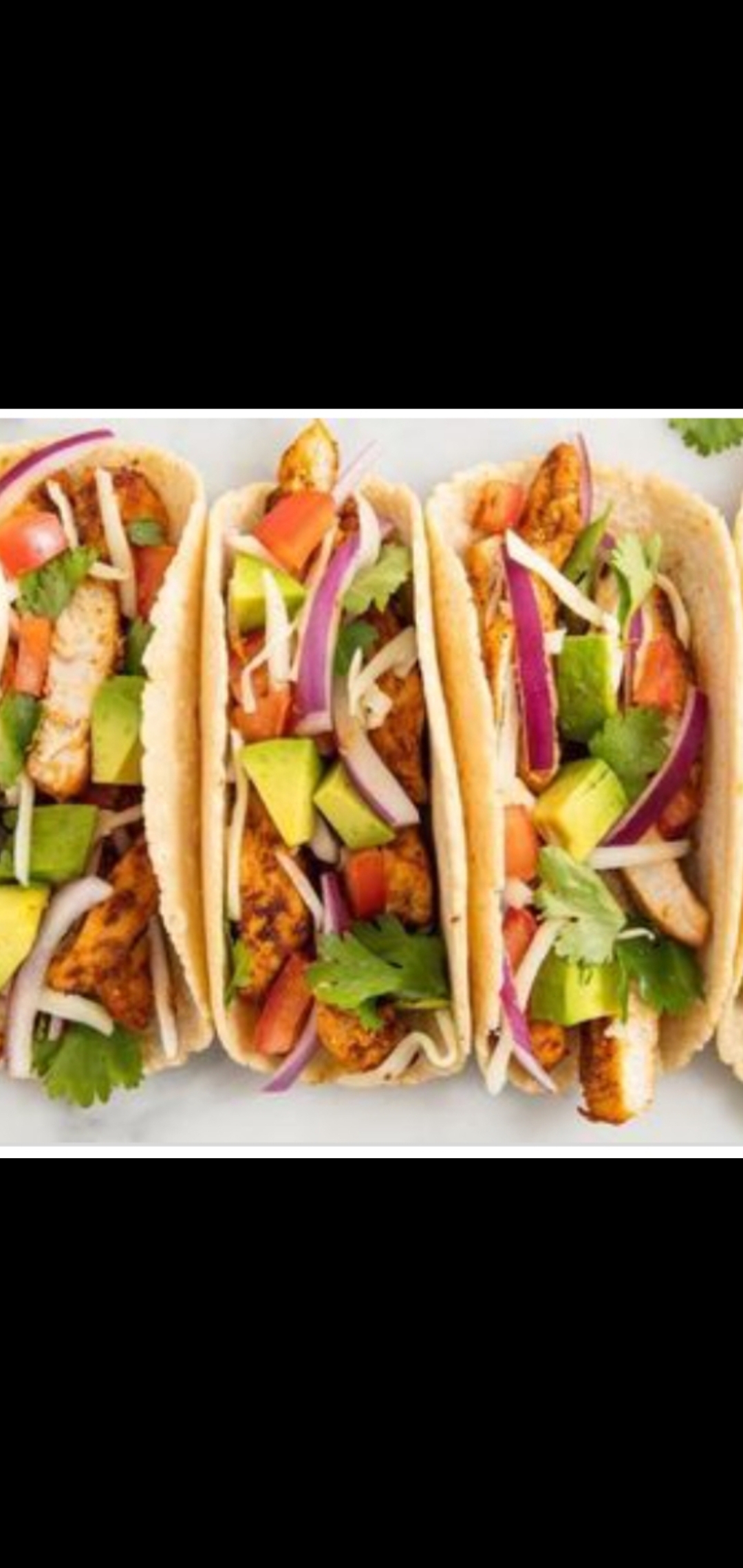 Order Spiced Chicken Tacos (spicy chicken,avocado, pepper  jack cheese, red onions, cilantro on soft corn  taco) food online from American Gourmet Foods Deli store, New York on bringmethat.com