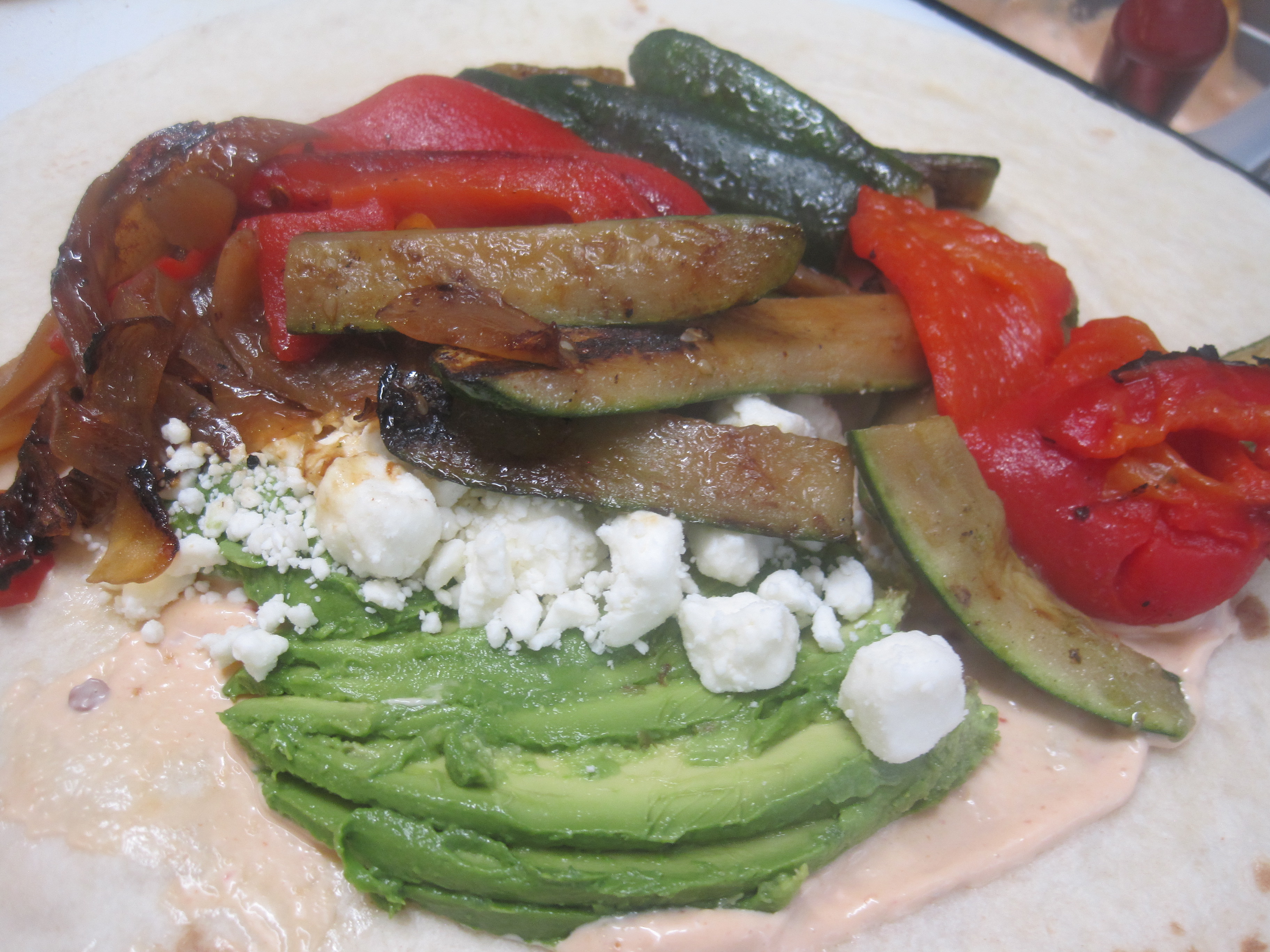 Order California Grilled Veggie Wrap food online from La Bakery store, Carson City on bringmethat.com