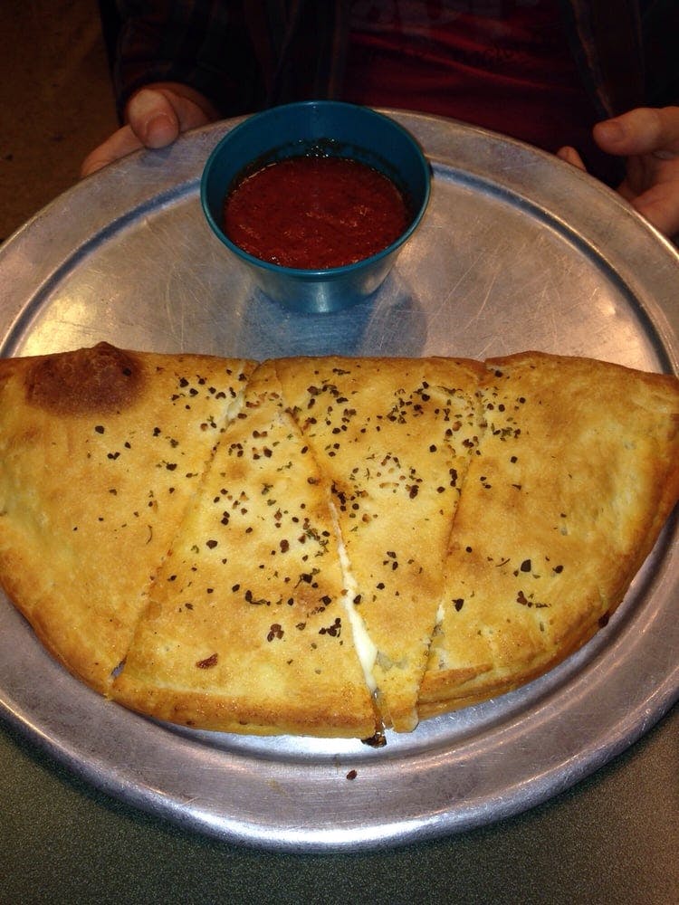 Order 1-Topping Calzone - 8" food online from Chicagos Pizza store, San Antonio on bringmethat.com