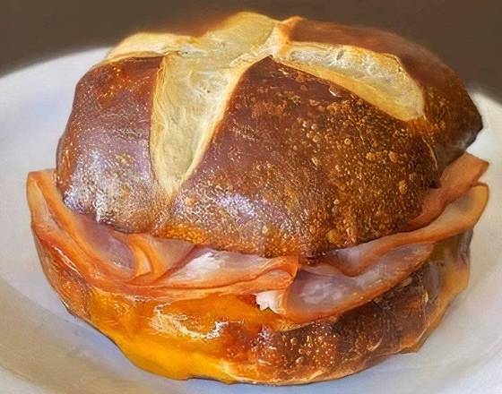 Order Pretzel Bun Sandwich - Turkey & Cheese food online from Sweetwaters Coffee & Tea store, Canton on bringmethat.com