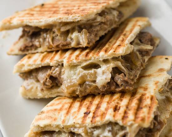 Order Philly Beef Panini food online from Zea Rotisserie & Bar - Kenner store, Kenner on bringmethat.com