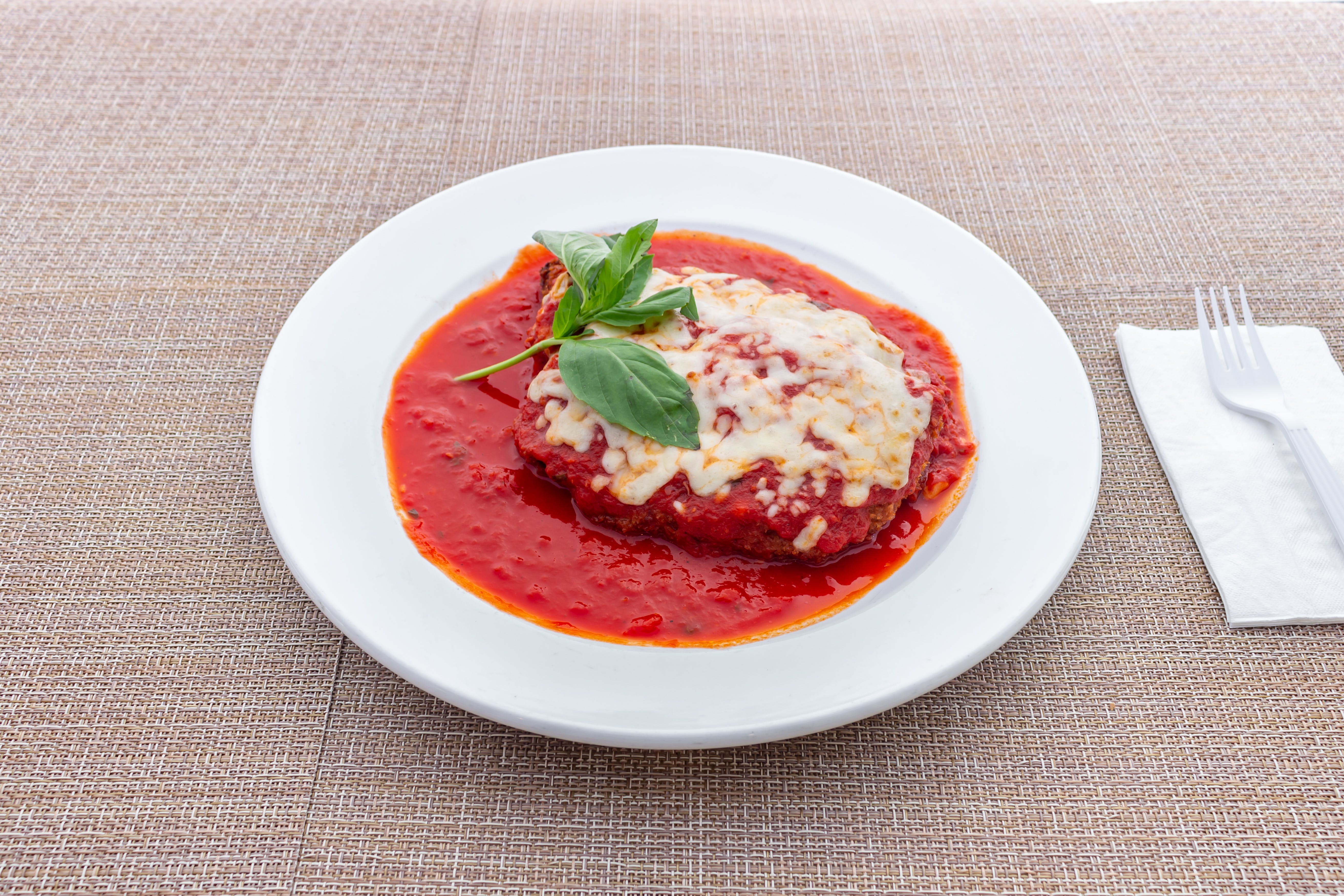 Order Chicken Parmigiana - Entree food online from Ralphy's Pizza And Restaurant store, Paramus on bringmethat.com