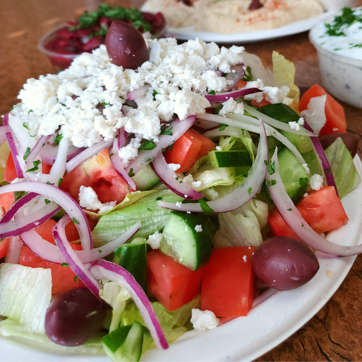 Order Greek Salad food online from Alwazir Chicken store, Los Angeles on bringmethat.com