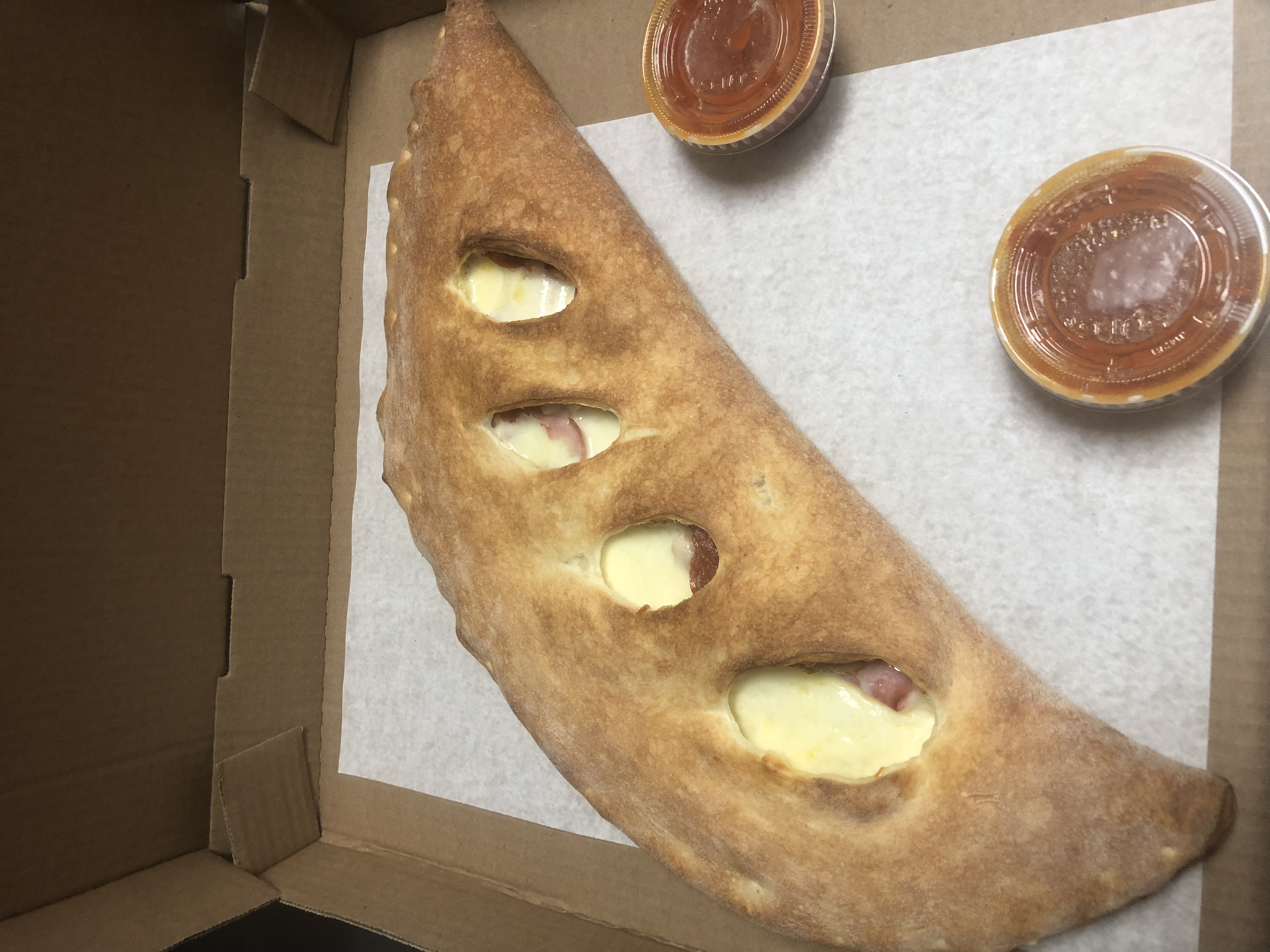 Order Spinach Calzone food online from Tonitos Pizza store, West Chester on bringmethat.com