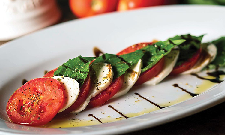 Order Insalata Caprese* food online from Russo's New York Pizzeria - Broadway store, Pearland on bringmethat.com