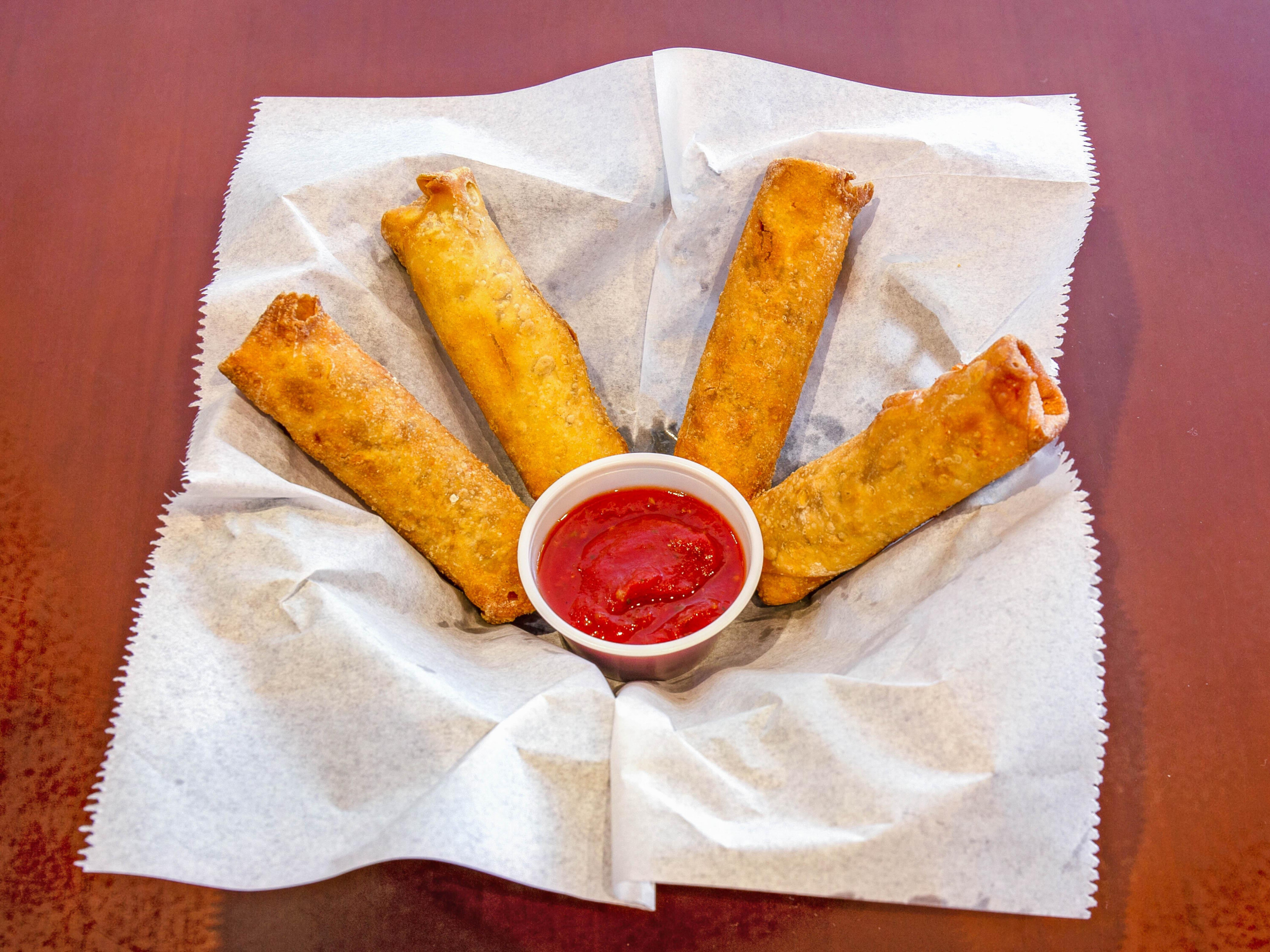 Order Pizza logs food online from Ray Wings And Pizza store, Omaha on bringmethat.com