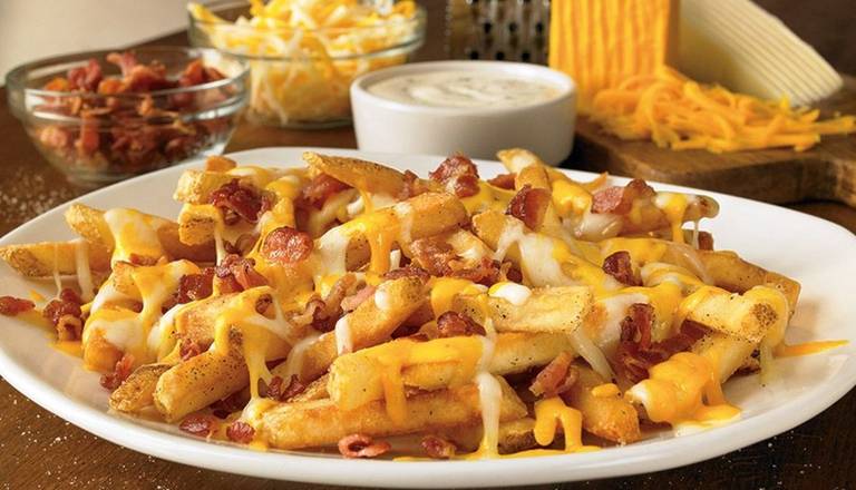 Order 3 Cheese & Bacon Fries food online from Freddy Wings And Wraps store, Newark on bringmethat.com