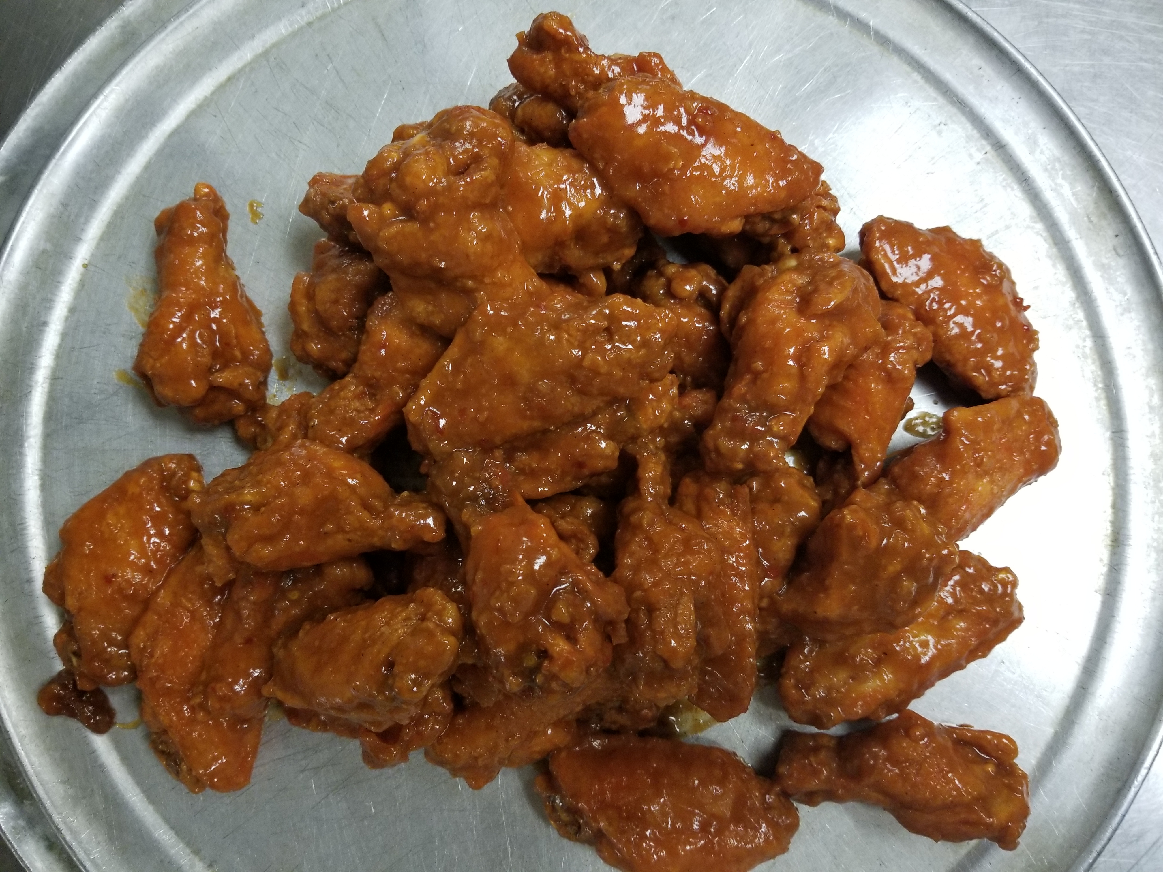 Order 6 Pieces Wings food online from H & A Deli store, Rochester on bringmethat.com