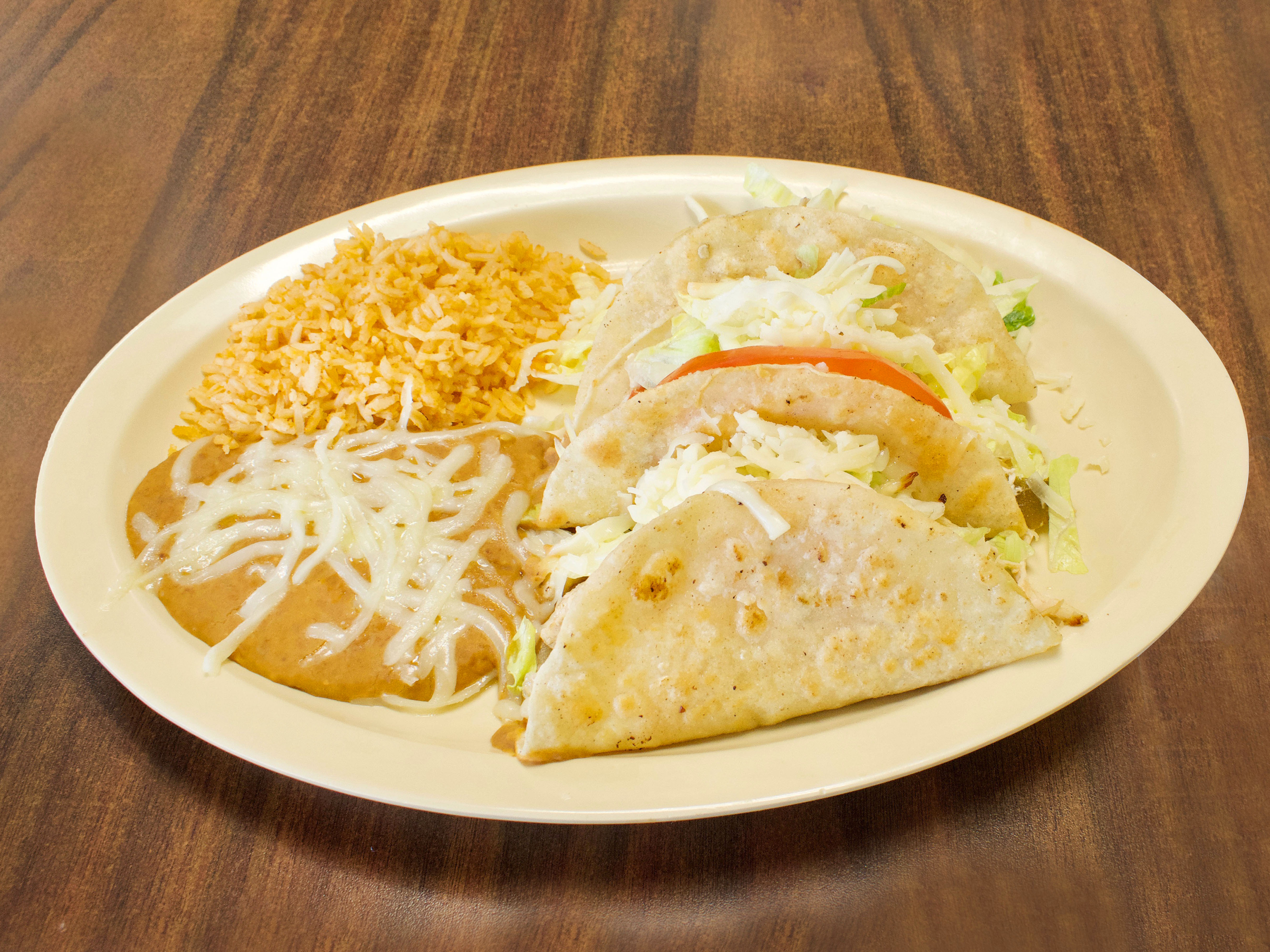 Order Chicken Tacos food online from Cuauhtemoc Cafe store, El Paso on bringmethat.com