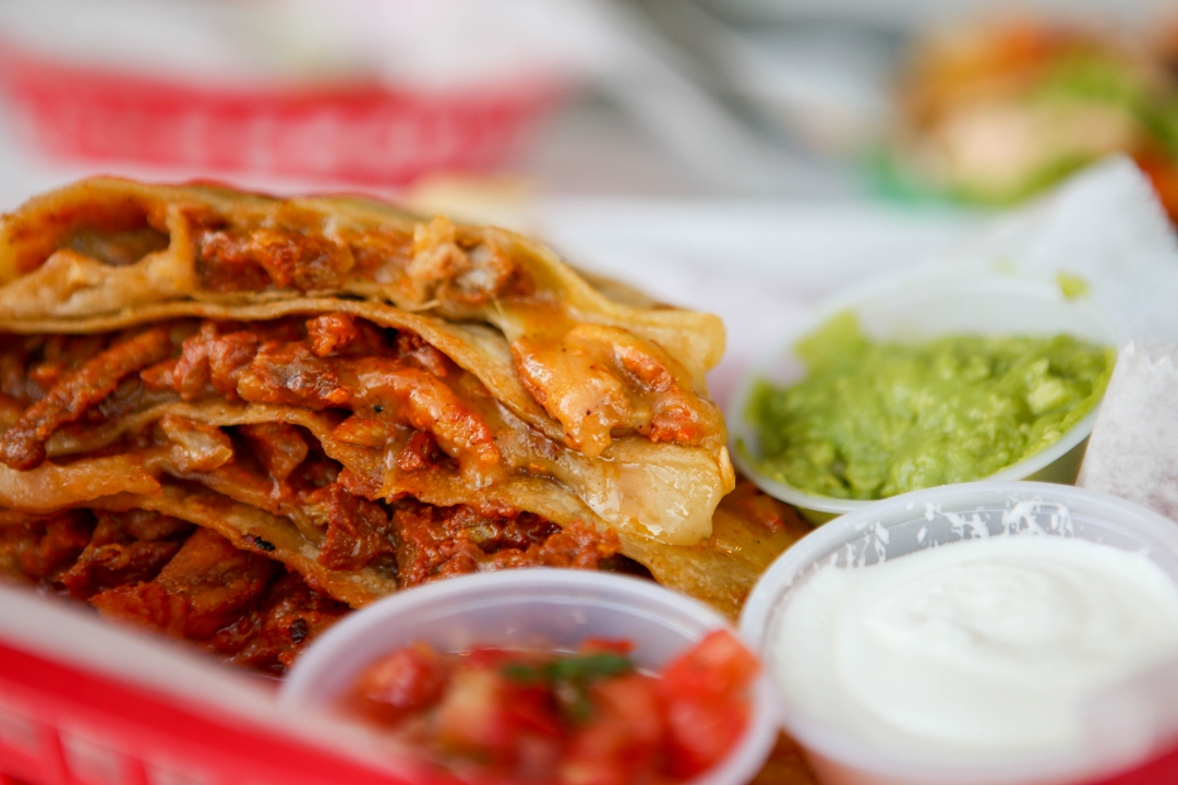 Order AL PASTOR QUESADILLA food online from The Taco Stand store, San Diego on bringmethat.com
