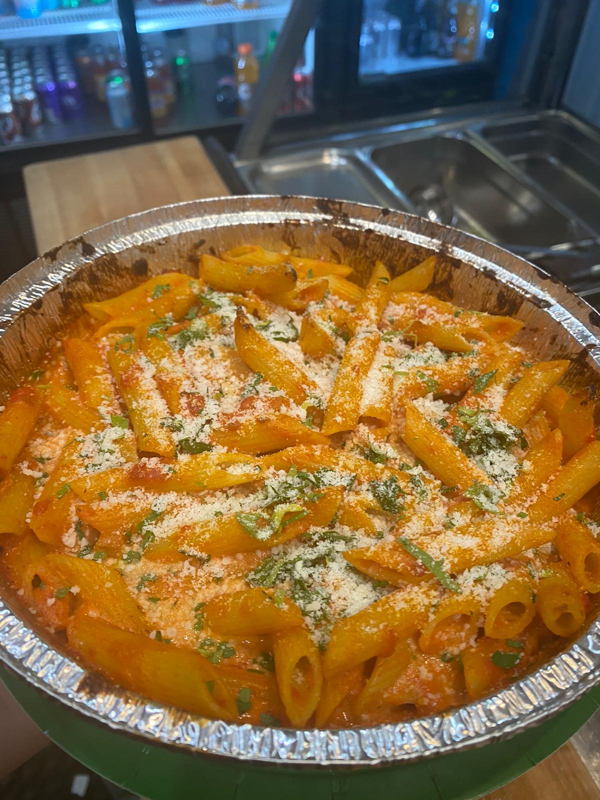 Order Penne ala vodka food online from Famous famiglia pizza store, New York on bringmethat.com