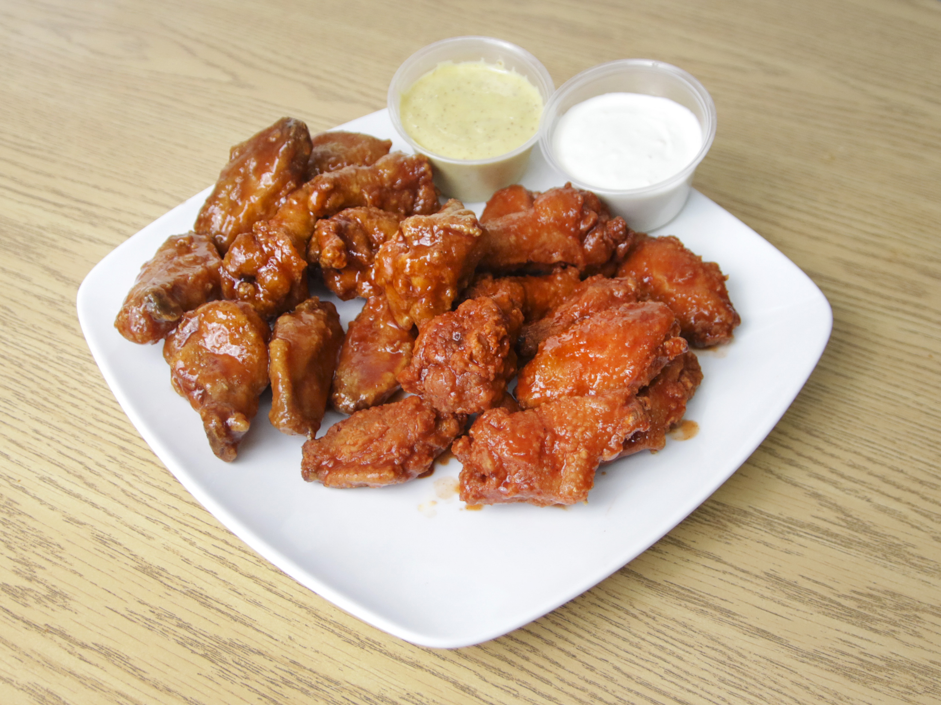 Order 20 Pieces Party Wing food online from Nu Wave Fish & Chicken store, Ypsilanti on bringmethat.com