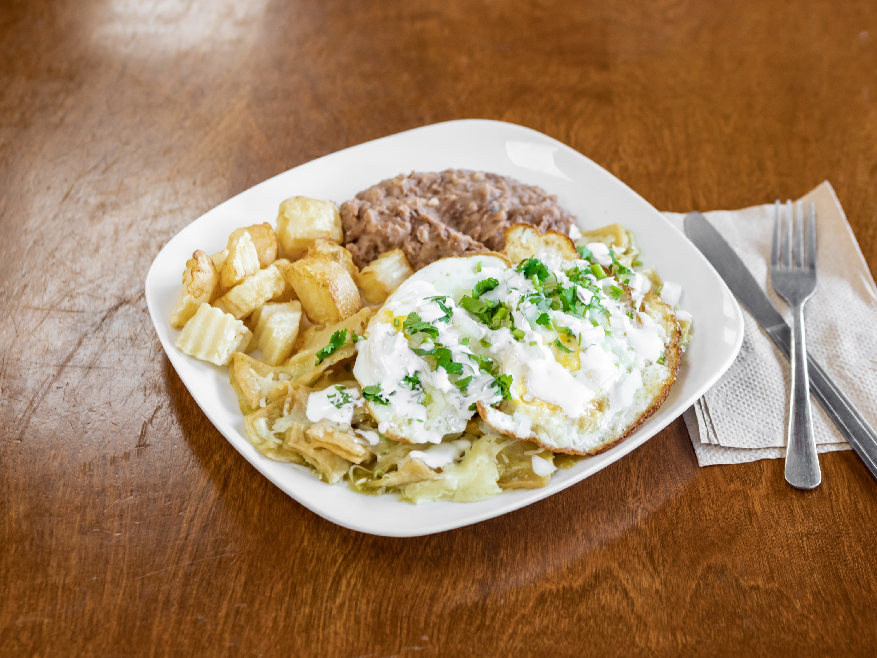 Order Chilaquiles food online from El Faro Mexican Food store, Austin on bringmethat.com