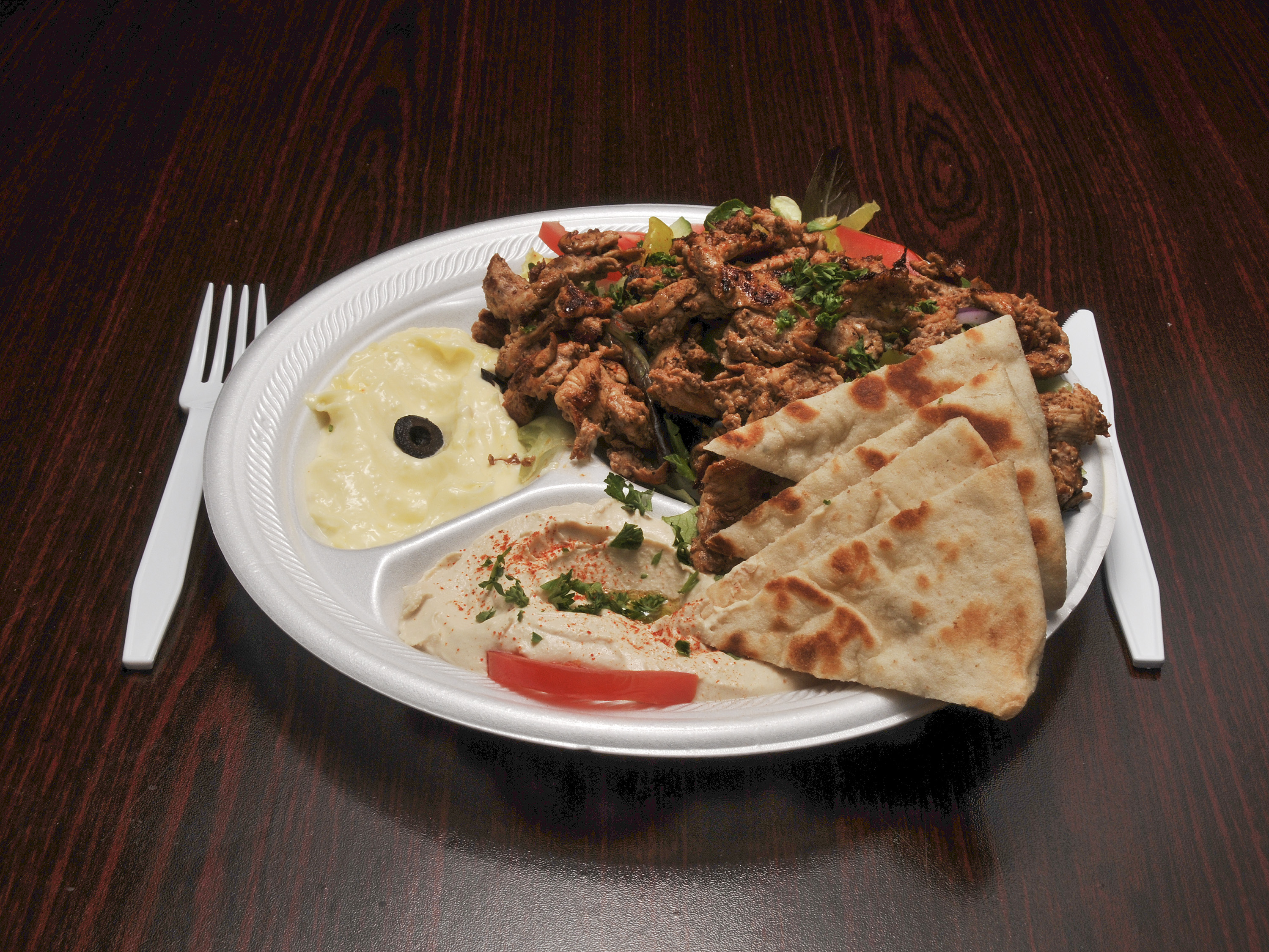 Order Shawarma Platter food online from Checkers pizza store, Raleigh on bringmethat.com