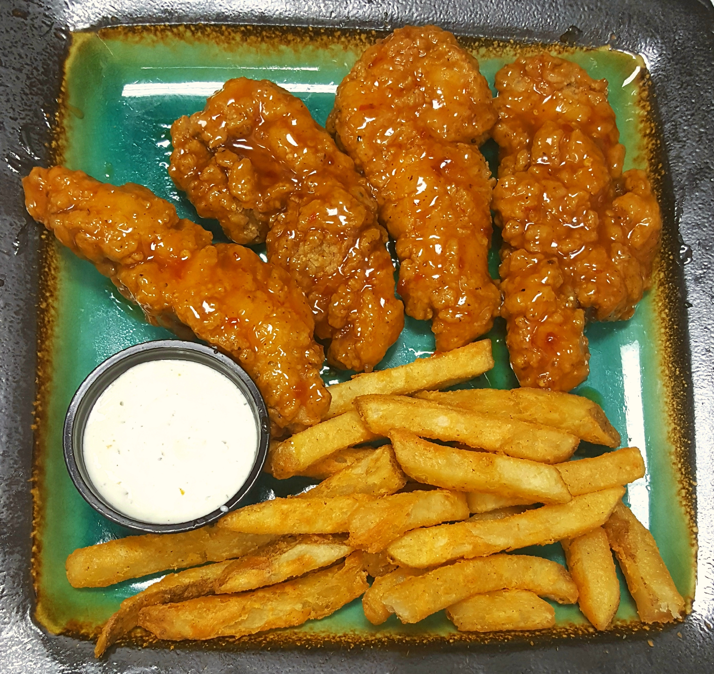 Order Sweet and Spicy Tenders and Fries food online from Springdale Cafe store, Huntington Beach on bringmethat.com
