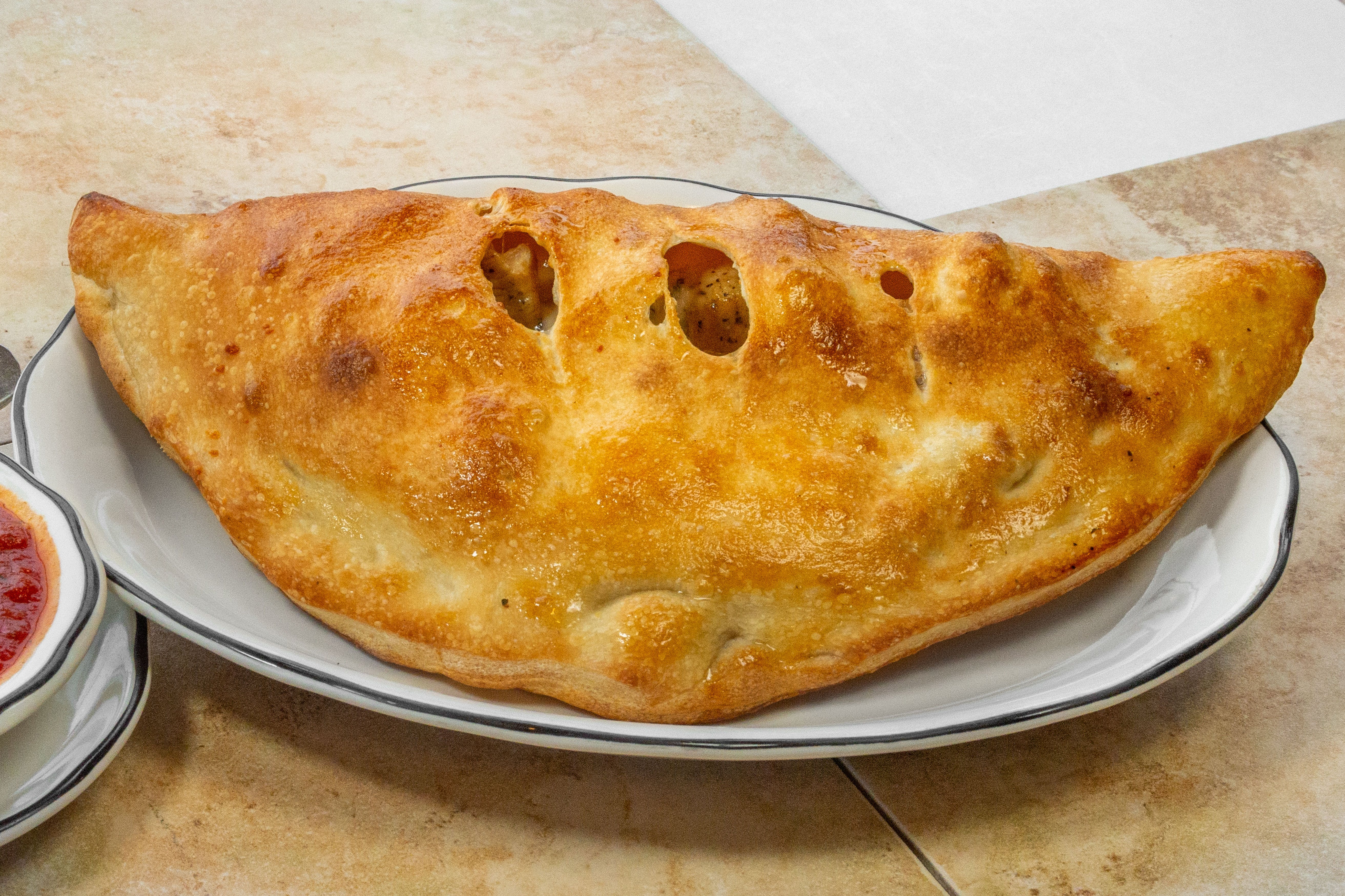 Order Calzone - Small 12" food online from Brunos Pizza store, Gibsonia on bringmethat.com