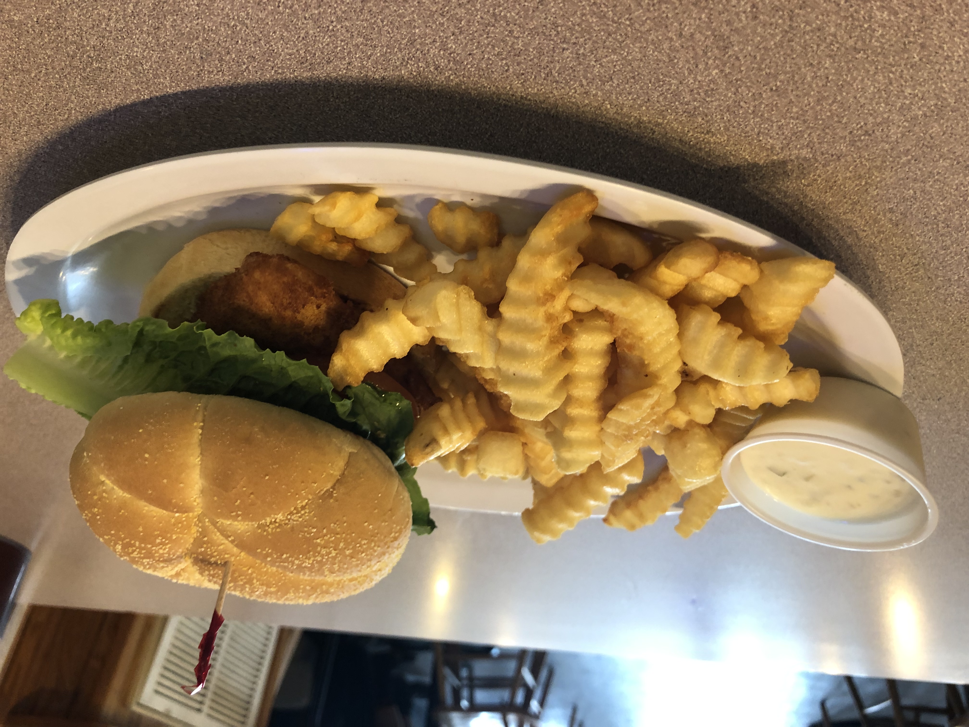 Order #32. Fish Sandwich food online from Klemm Candlelight Cafe store, Fort Wayne on bringmethat.com