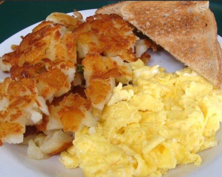 Order Kid's Two Eggs, Potatoes, and Toast food online from Janik's Cafe store, Chicago on bringmethat.com