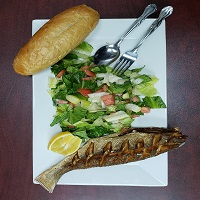 Order Salad with Croaker Fish food online from Habesha Market and Carry-Out store, Washington on bringmethat.com