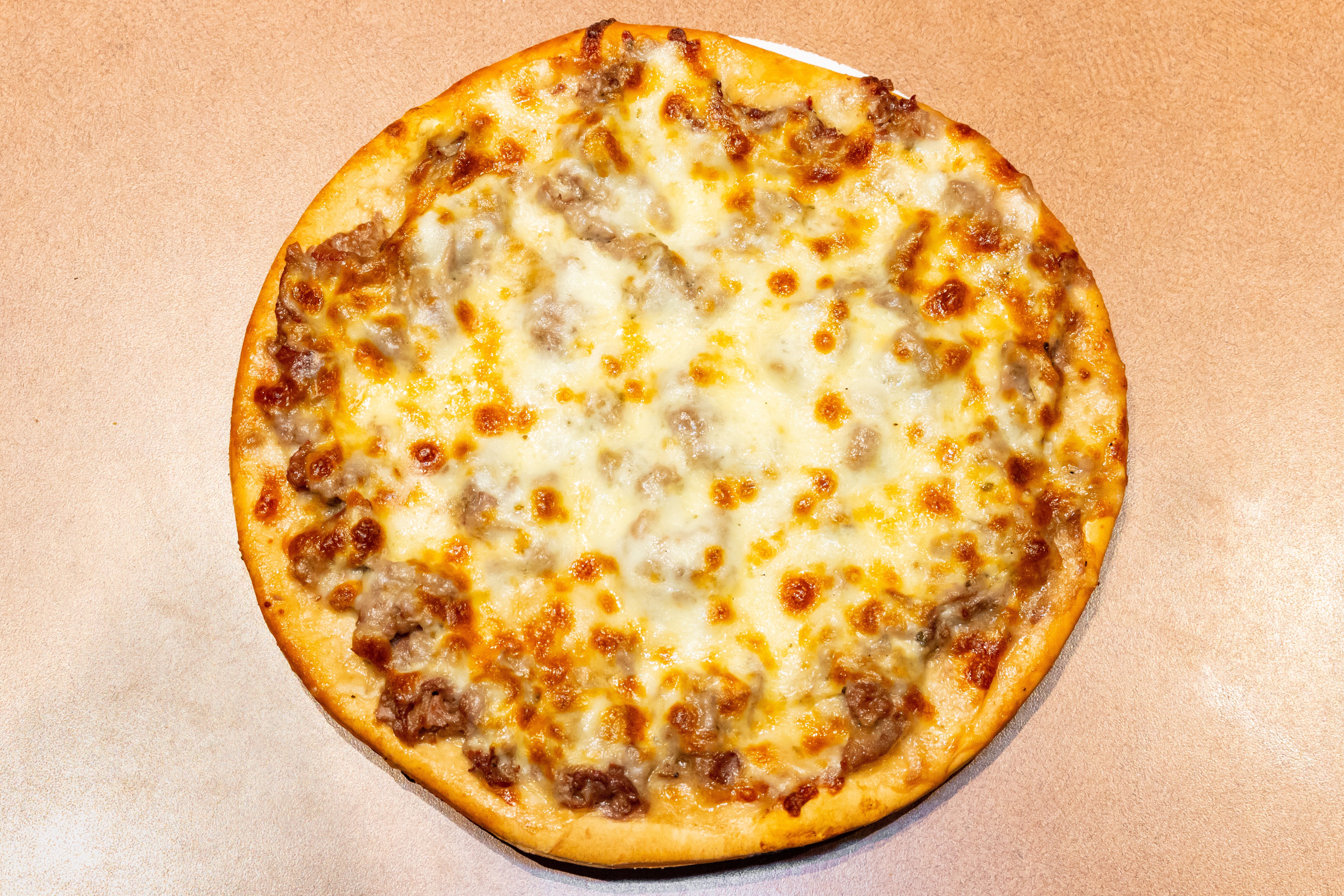 Order Cheesy Beef & Gravy Pizza - 10'' (Serves 1-2 People) food online from Pyramid Pizza & Sports Bar store, Addison on bringmethat.com
