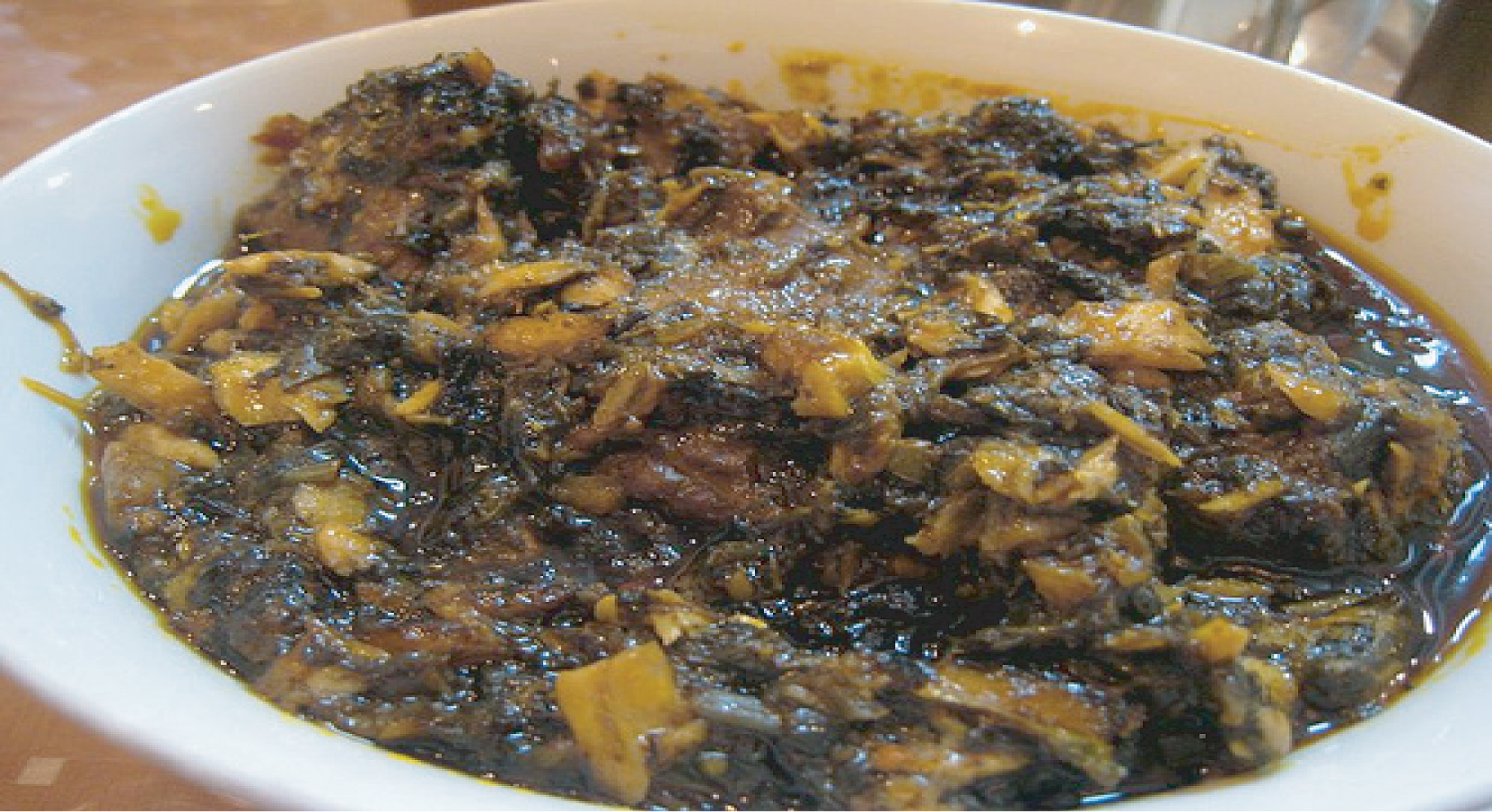 Order Cassava Leaf (Not Spicy) + Fufu or Rice food online from Flavors Of Africa store, Lilburn on bringmethat.com