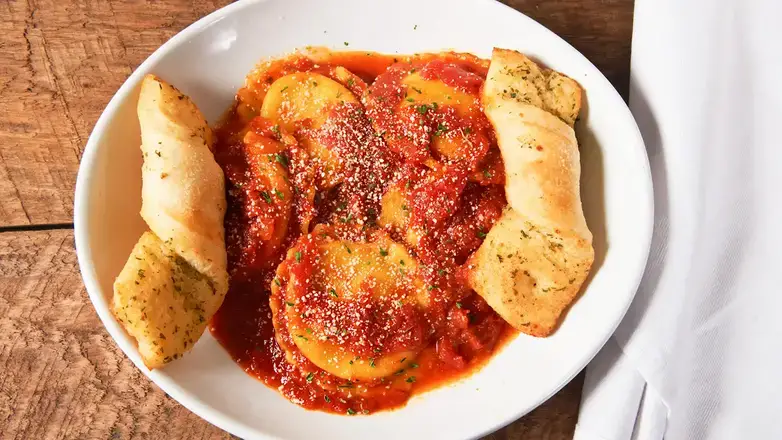 Order Four Cheese Ravioli food online from Zeppe'S Pizzeria store, Middlefield on bringmethat.com
