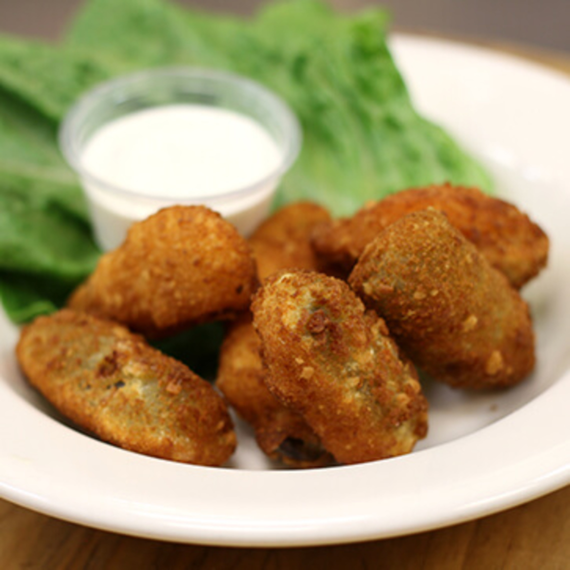 Order Jalapeno Poppers food online from Tony's Pizza store, Hickory on bringmethat.com