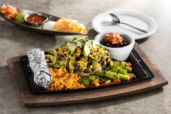 Order Black Bean & Veggie Fajitas (with Avocado) food online from Chilis store, Highlands Ranch on bringmethat.com
