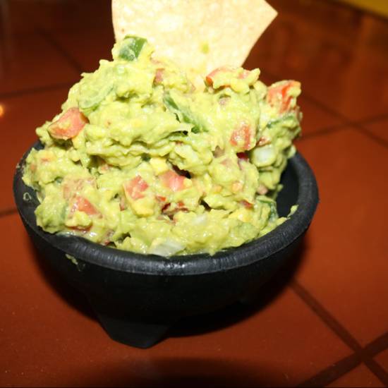 Order guacamole with chips food online from La Mansion Restaurant store, New Orleans on bringmethat.com