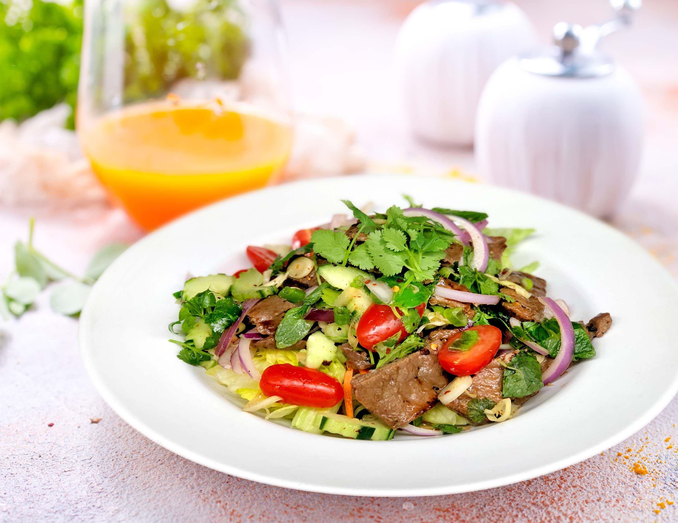 Order Spicy Beef Salad food online from Ubon Thai Kitchen store, Torrance on bringmethat.com