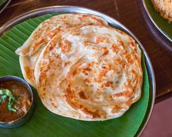 Order Oor Style Parotta food online from Nala’S Indian Restaurant store, Austin on bringmethat.com