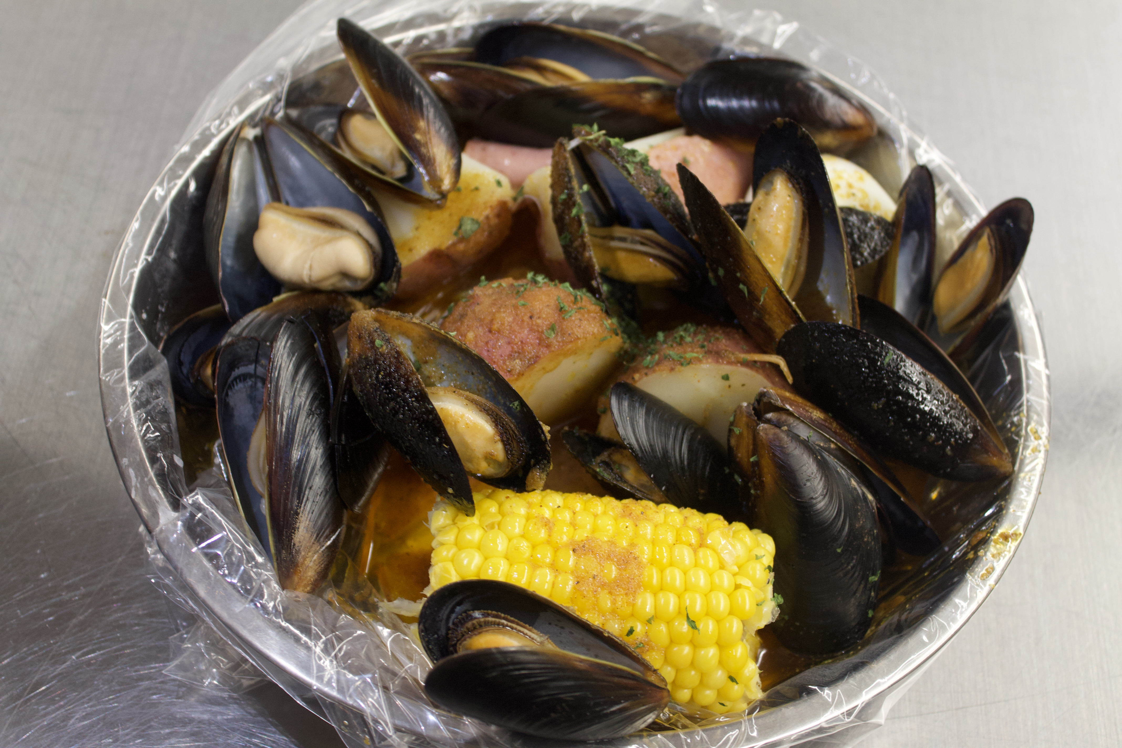 Order Black Mussel food online from New Lucky Crab House store, Oakwood on bringmethat.com