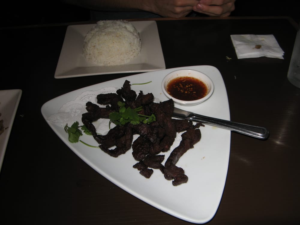 Order 93. Thai Beef Jerky food online from Nine & Nine Thai Kitchen store, Pasadena on bringmethat.com
