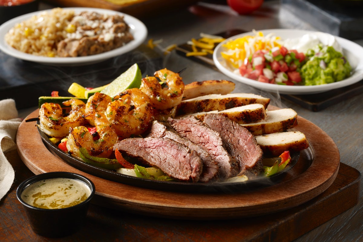 Order Grande Fajita food online from On The Border Mexican Grill store, Princeton on bringmethat.com