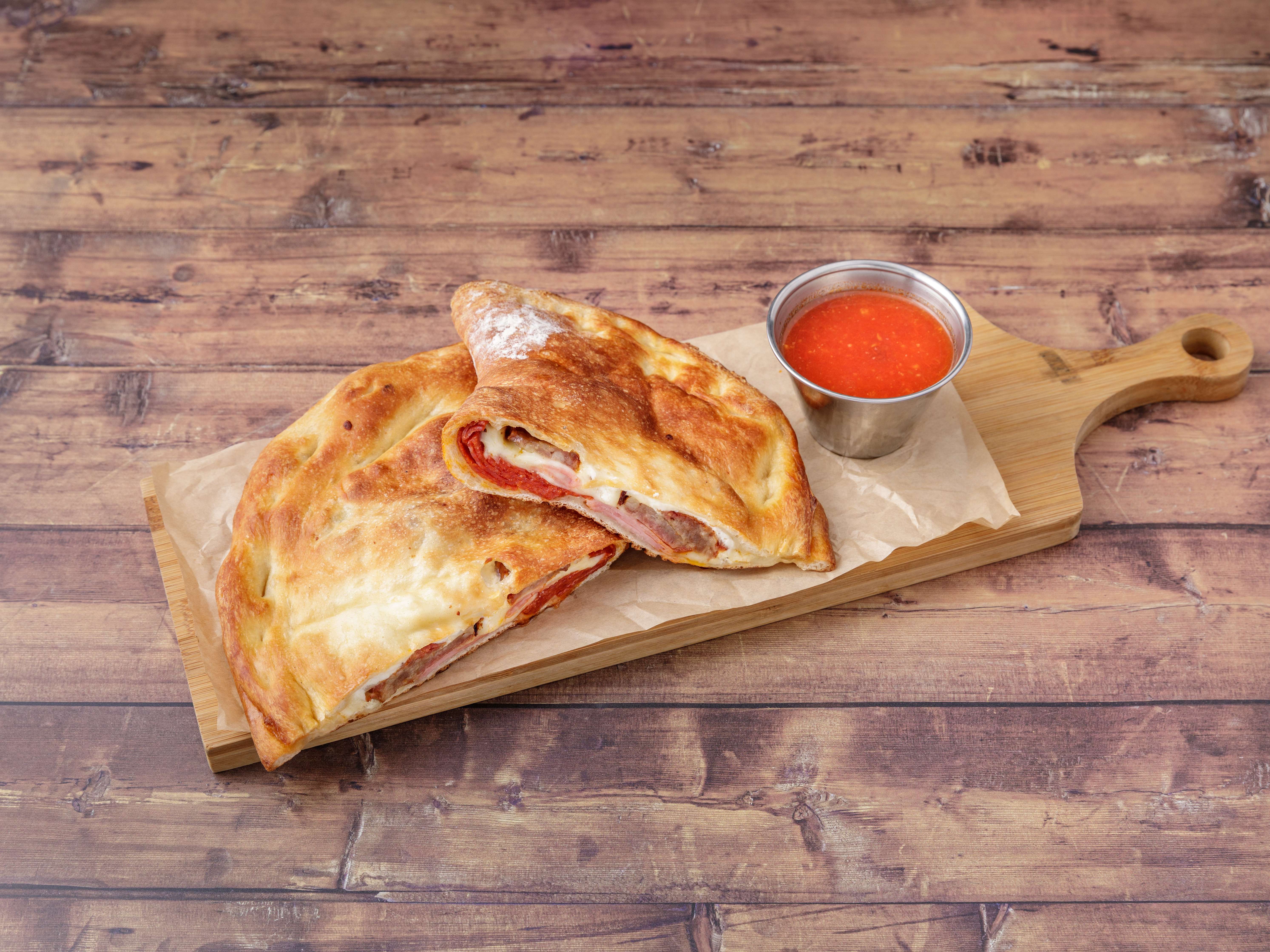 Order Meat Calzone food online from Riossi Pizza store, New York on bringmethat.com
