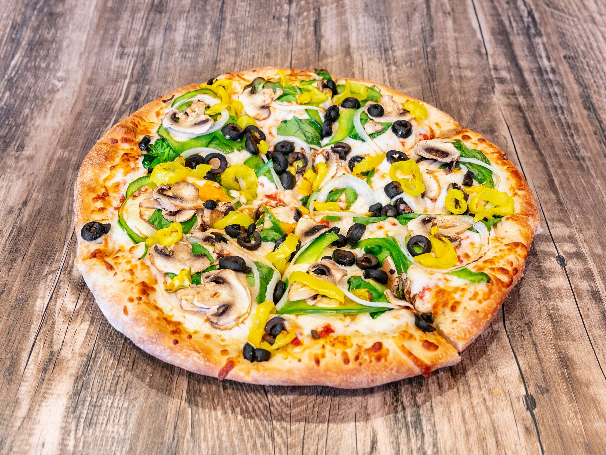 Order Veggie Eaters Pizza food online from Cutting Edge Pizza & Wings store, Atlanta on bringmethat.com