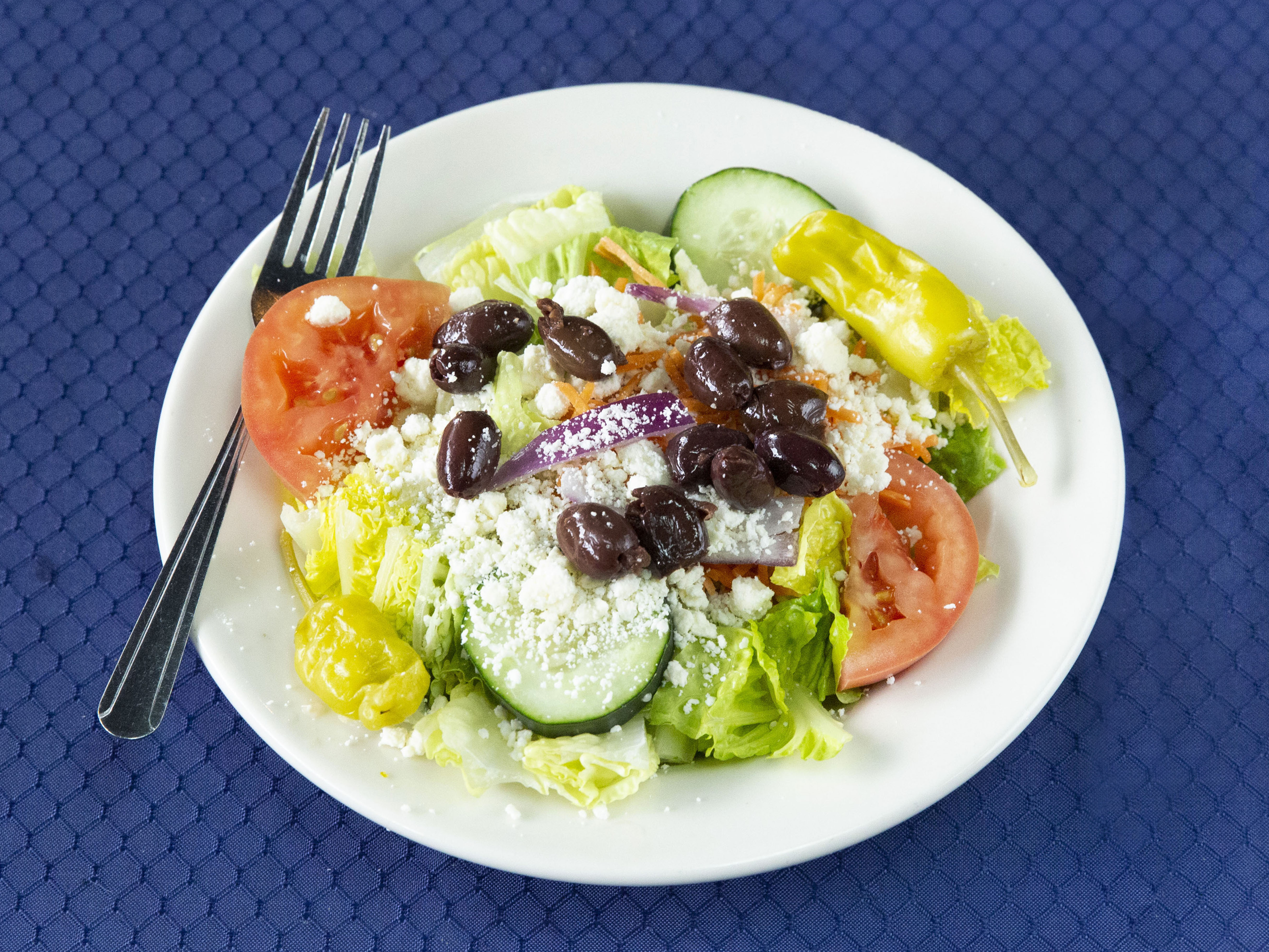 Order Greek Salad food online from The Garlic Knot - University Hills store, Denver on bringmethat.com