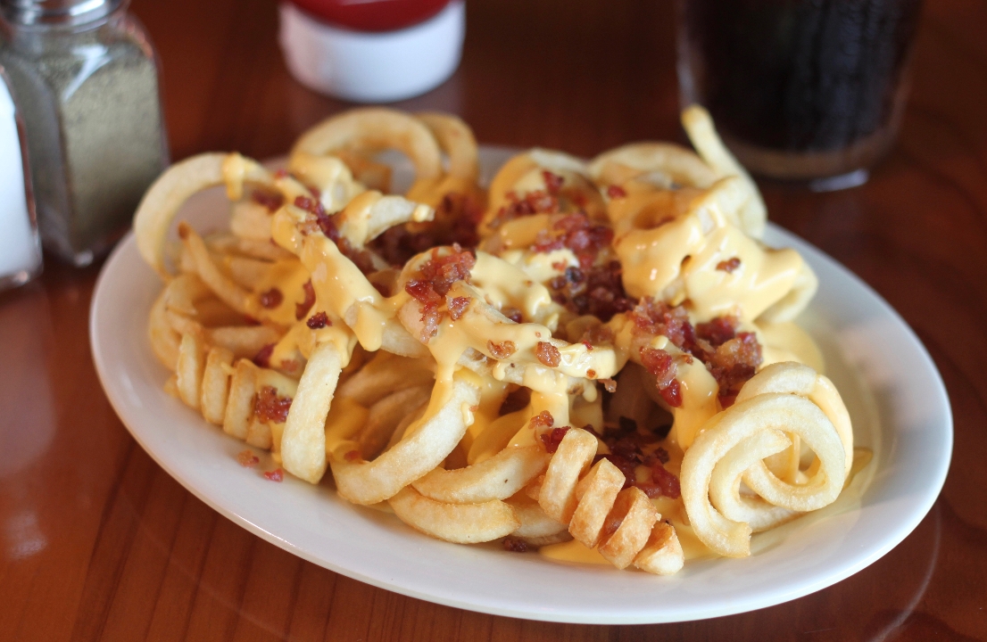 Order Cheesy Bacon Fries * food online from Roosters store, Huntington on bringmethat.com