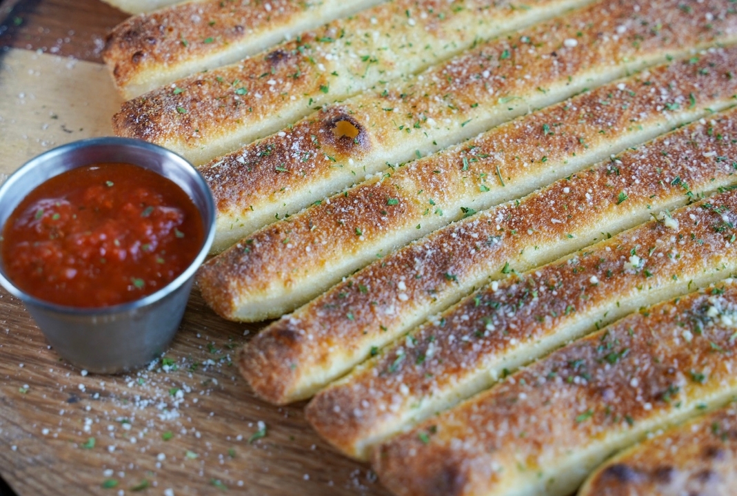 Order BREADSTICKS food online from Daddyo Pizza store, Katy on bringmethat.com