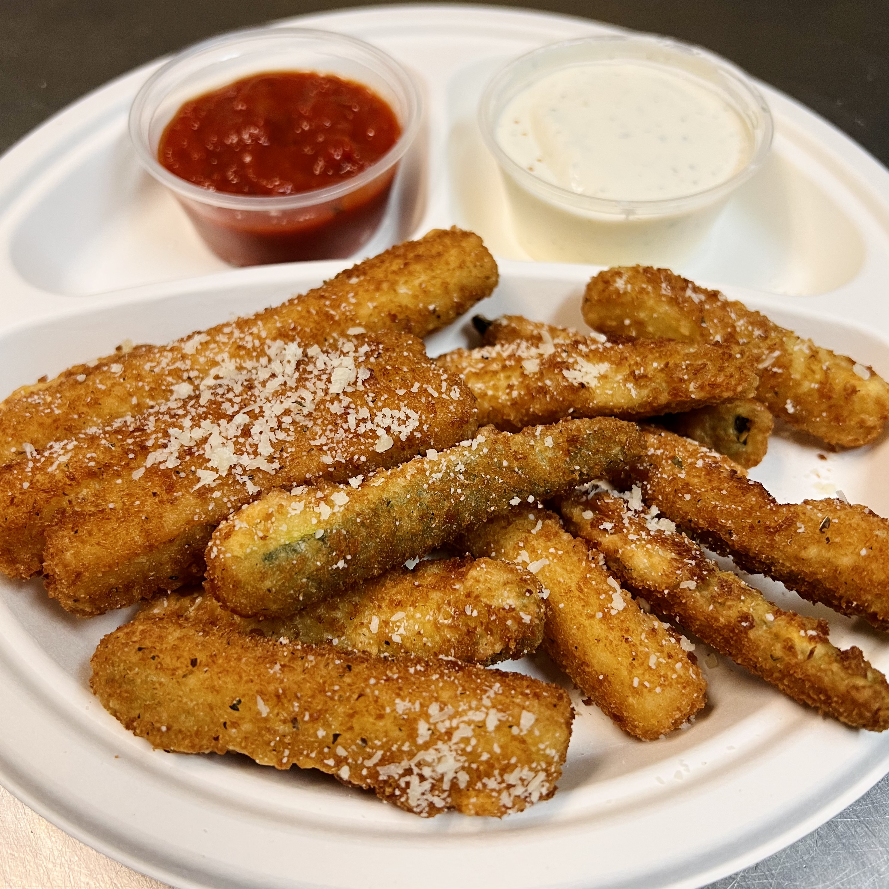 Order Crispy Zucchini with Parmesan Cheese food online from NoHo Pizza & Grill store, North Hollywood on bringmethat.com