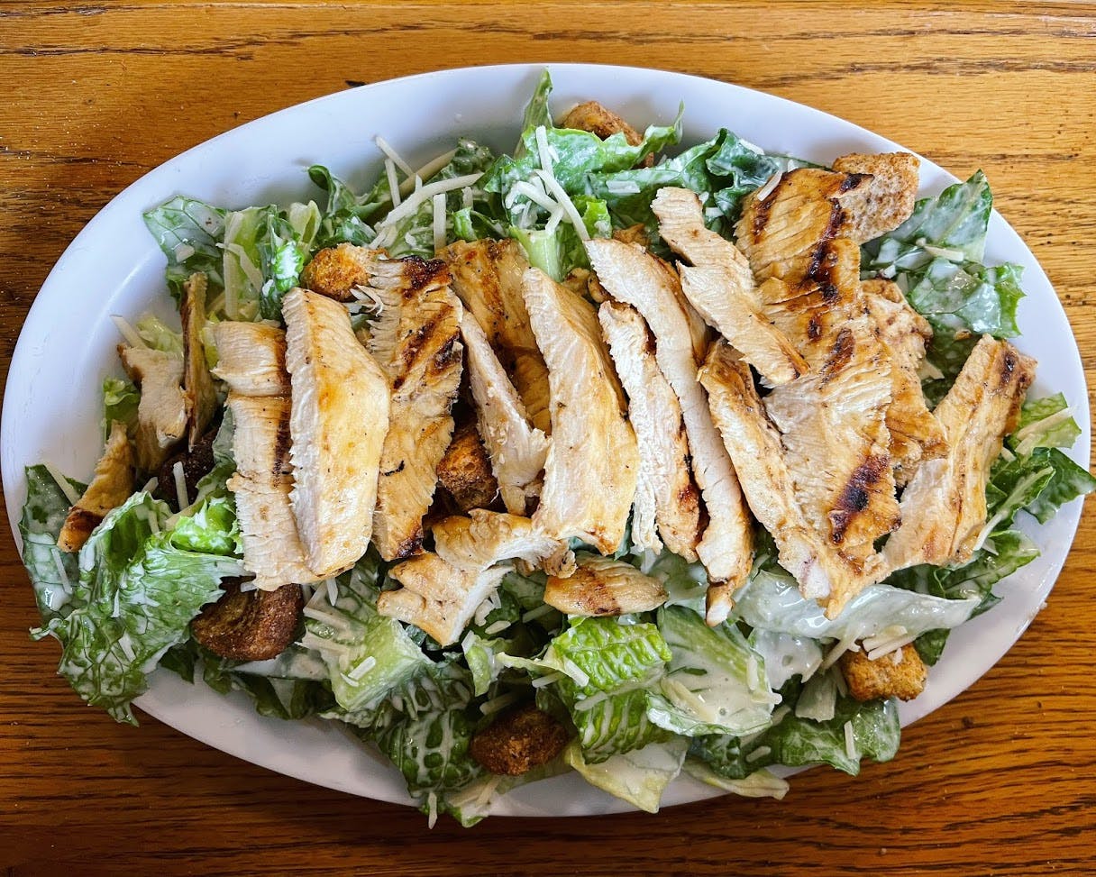 Order Caesar Salad - Salad food online from Sonny Restaurant & Pizzeria store, Englewood on bringmethat.com
