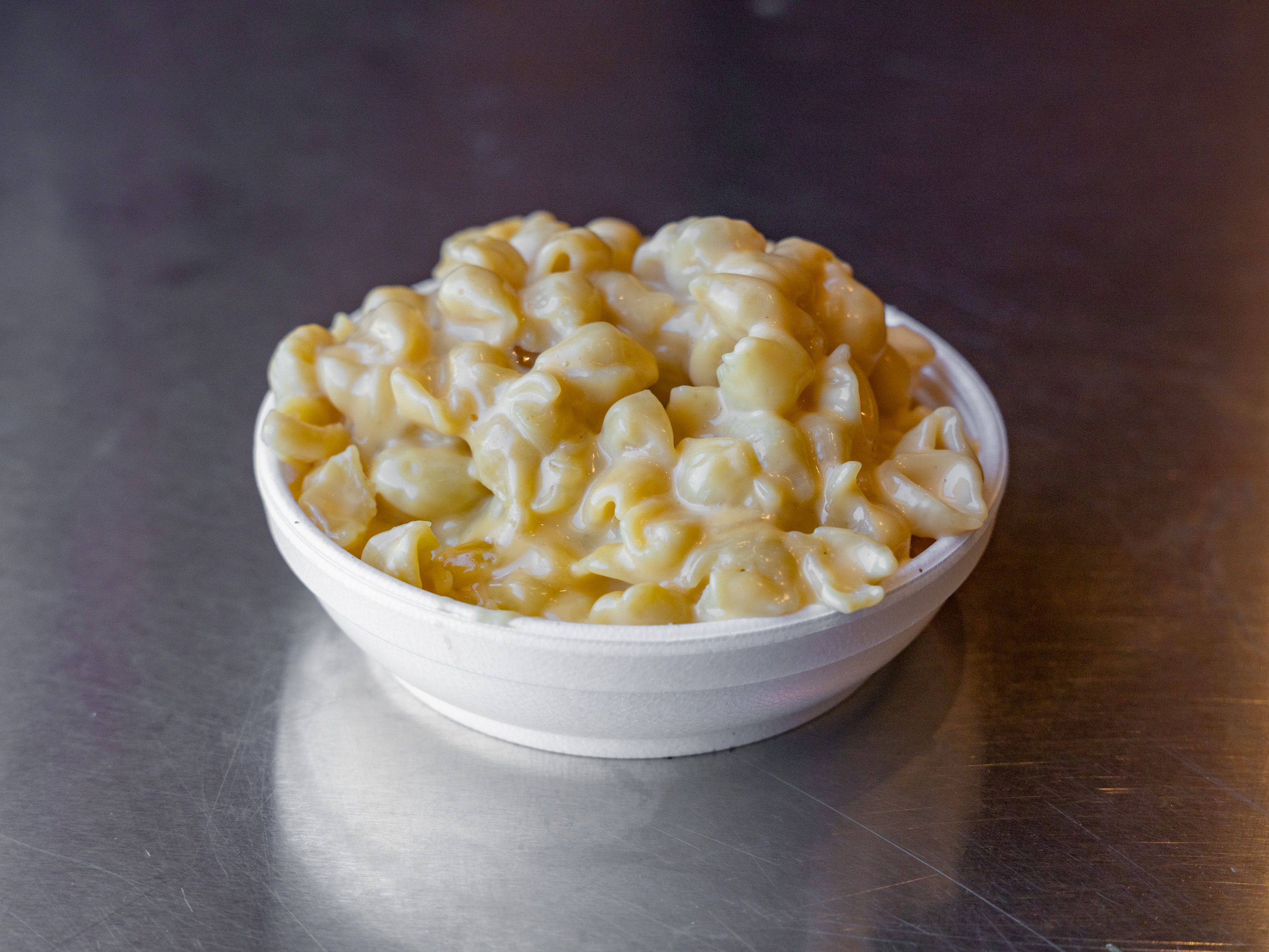 Order 8oz Mac and Cheese food online from The Smoke N Pig Bbq store, Lansing on bringmethat.com