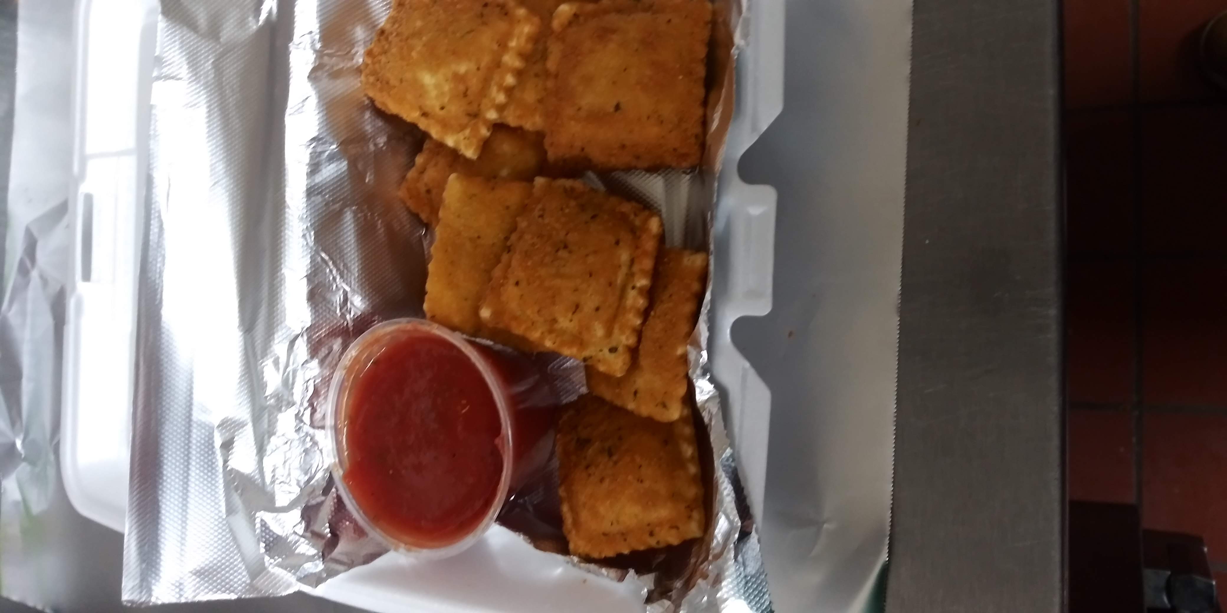 Order Fried Ravioli with Sauce food online from Pizza Italia store, Pittsburgh on bringmethat.com