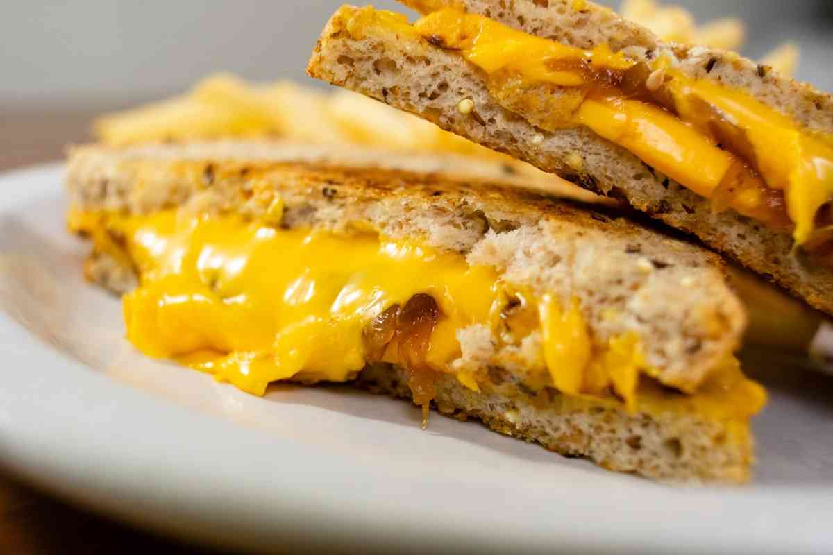 Order Grilled Cheese on 7 Grain food online from Village Hands Cafe store, Monroe on bringmethat.com