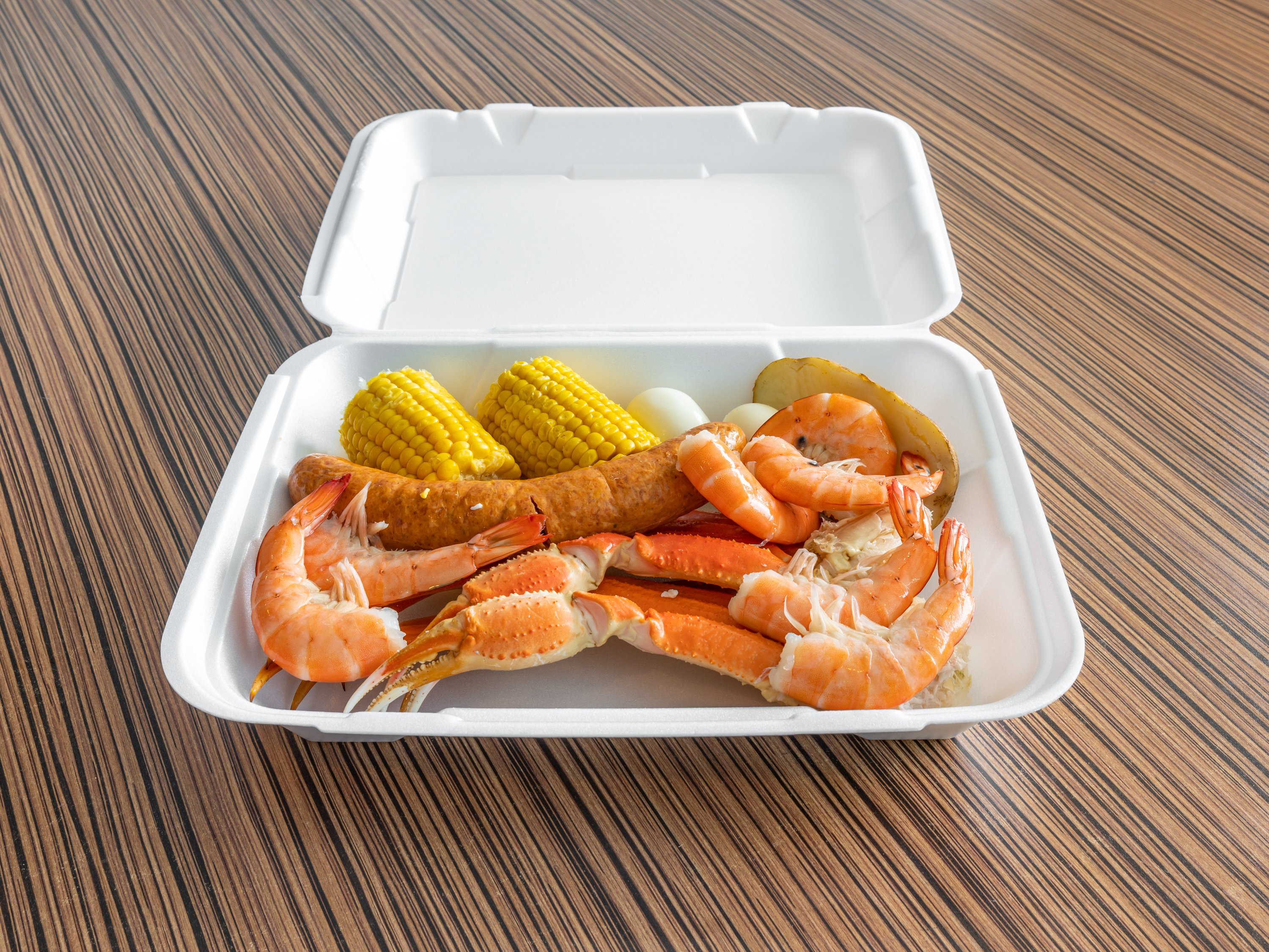 Order Snow Crab Combo food online from Ocean Crab House store, Warner Robins on bringmethat.com